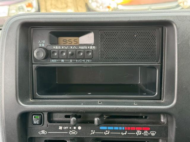 ハイゼットカーゴ スペシャル　ハイルーフ　４人乗り　集中ドアロック　両側スライドドア　ヘッドライトレベライザー　荷室フルフラット　エアバック　スペアキー×２本　タイヤ７分山　禁煙車　取扱説明書（3枚目）