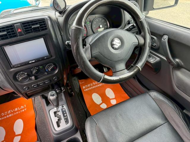 ジムニー クロスアドベンチャーＸＣ　８型ＡＴ　４ＷＤ　ターボ　ハーフレザーシート　キーレスエントリー　ＥＴＣ　ヘッドライトレベライザー　Ｄｅｆｉブーストメーター　シートヒーター　ルーフキャリア　フォグランプ　ドアバイザー　電動格納ミラー（18枚目）