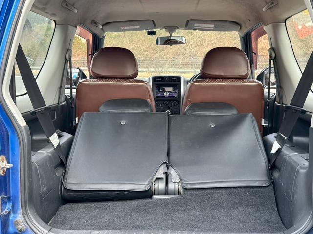 ジムニー ＸＧ　６型５ＭＴ　リフトアップ　社外オーディオ　Ｂｌｕｅｔｏｏｔｈ　ターボ　革調シートカバー　社外マフラー　オーバーフェンダー　ＬＥＤライト・デイライト　ショートバンパー　フロントテーブル　光軸調整ライト（15枚目）