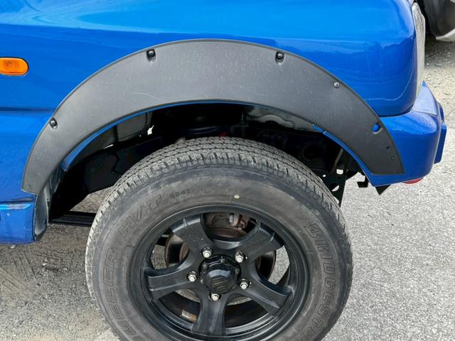 ジムニー ＸＧ　６型５ＭＴ　リフトアップ　社外オーディオ　Ｂｌｕｅｔｏｏｔｈ　ターボ　革調シートカバー　社外マフラー　オーバーフェンダー　ＬＥＤライト・デイライト　ショートバンパー　フロントテーブル　光軸調整ライト（17枚目）