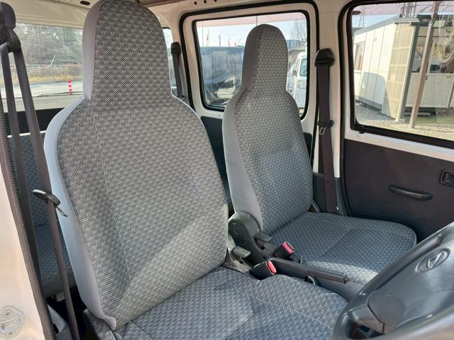 ハイゼットカーゴ スペシャル　ハイルーフ　４人乗　純正ラジオ　集中ドアロック　両側スライドドア　ヘッドライトレベライザー　エアコン　パワステ　ダブルエアバッグ　フルフラットシート　ドアバイザー　レンタカーアップ車　取扱説明書（15枚目）