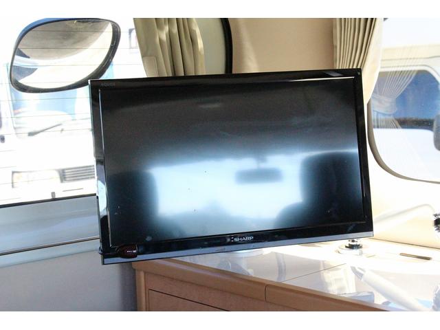 ＮＶ２００バネットバン キャンピングカー広島　ポップコンｅＥ　ポップアップルーフ　ＦＦヒーター　冷蔵庫　シンク　カセットコンロ　架装部ＴＶ　サブバッテリー　走行充電器　外部充電器　３５０Ｗインバーター　地デジチューナー　ナビ　バックカメラ　ＥＴＣ　１オーナー車（12枚目）