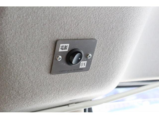 ＮＶ２００バネットバン キャンピングカー広島　ポップコンｅＥ　ポップアップルーフ　ＦＦヒーター　冷蔵庫　シンク　カセットコンロ　架装部ＴＶ　サブバッテリー　走行充電器　外部充電器　３５０Ｗインバーター　地デジチューナー　ナビ　バックカメラ　ＥＴＣ　１オーナー車（65枚目）