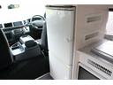 ハイエースバン ＲＶビックフット　リトルノオクタービアＭ　ＦＦヒーター　１５００Ｗインバーター　冷蔵庫　ソーラーパネル（２枚）　シンク　ＩＨコンロ　レンジ　ツインサブＢＴ　走行充電　外部充電　マックスファン　フリップダウンモニター　リアスピーカー　１オーナー（8枚目）