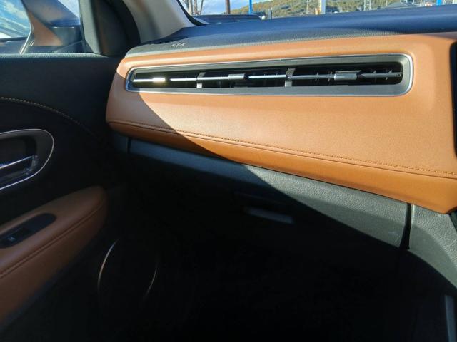 ヴェゼル ハイブリッドＺ・ホンダセンシング　純正ナビ　ＴＶ　ＥＴＣ　茶ハーフレザーシート　ドラレコ　純正１７ＡＷ　Ｂｌｕｅｔｏｏｔｈ　Ｂカメラ　ホンダセンシング　シートヒーター　Ｐスタート　スマートキー２個（32枚目）