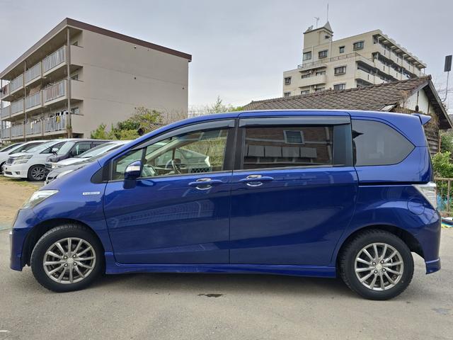 フリードハイブリッド ジャストセレクション　ドライブレコーダー　ＥＴＣ　バックカメラ　ナビ　ＴＶ　オートクルーズコントロール　両側電動スライドドア　オートライト　ＨＩＤ　スマートキー　電動格納ミラー　３列シート　ウォークスルー　ＣＶＴ（23枚目）