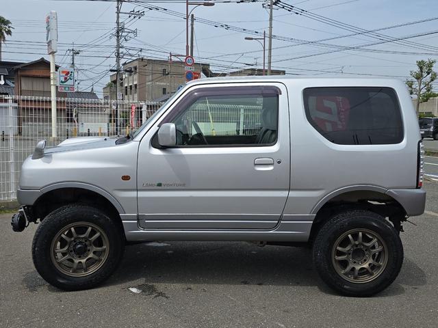 ジムニー ランドベンチャー　４ＷＤ　ナビ　ＴＶ　アルミホイール　キーレスエントリー　電動格納ミラー　革シート　ＭＴ　衝突安全ボディ　ＣＤ　ＤＶＤ再生　ＵＳＢ　ＡＢＳ　エアコン　パワーステアリング　パワーウィンドウ（21枚目）