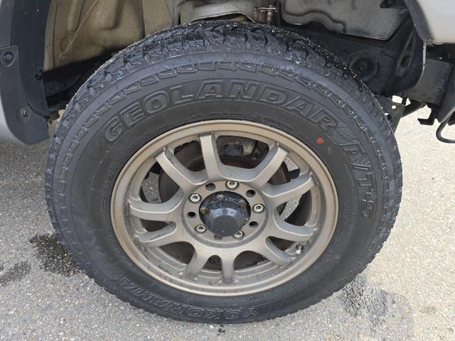 ジムニー ランドベンチャー　４ＷＤ　ナビ　ＴＶ　アルミホイール　キーレスエントリー　電動格納ミラー　革シート　ＭＴ　衝突安全ボディ　ＣＤ　ＤＶＤ再生　ＵＳＢ　ＡＢＳ　エアコン　パワーステアリング　パワーウィンドウ（22枚目）