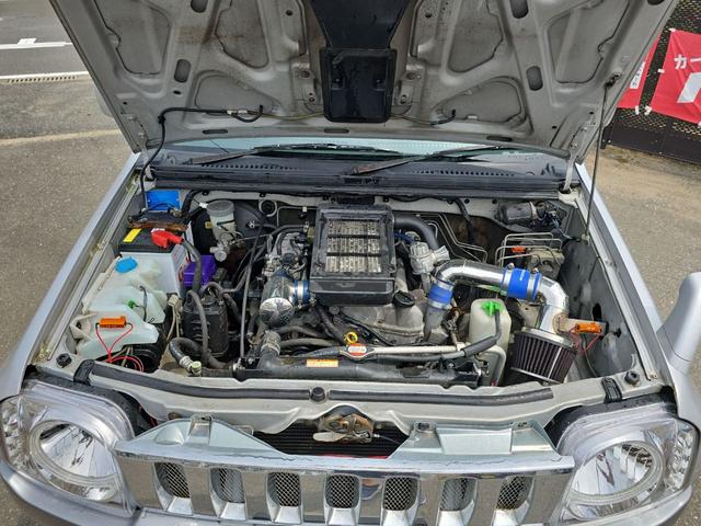 ジムニー ランドベンチャー　４ＷＤ　ナビ　ＴＶ　アルミホイール　キーレスエントリー　電動格納ミラー　革シート　ＭＴ　衝突安全ボディ　ＣＤ　ＤＶＤ再生　ＵＳＢ　ＡＢＳ　エアコン　パワーステアリング　パワーウィンドウ（35枚目）