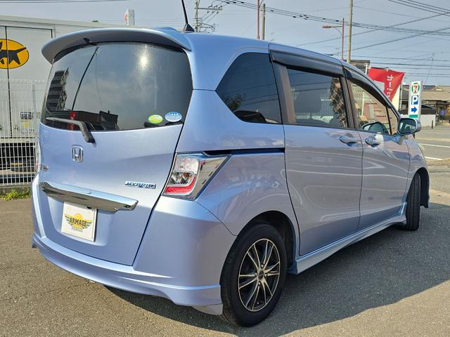 フリードハイブリッド ハイブリッド　ドライブレコーダー　ＥＴＣ　バックカメラ　ナビ　ＴＶ　両側スライド・片側電動　キーレスエントリー　アイドリングストップ　電動格納ミラー　３列シート　ウォークスルー　ＣＶＴ　アルミホイール　ＣＤ　ＵＳＢ（15枚目）