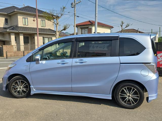 フリードハイブリッド ハイブリッド　ドライブレコーダー　ＥＴＣ　バックカメラ　ナビ　ＴＶ　両側スライド・片側電動　キーレスエントリー　アイドリングストップ　電動格納ミラー　３列シート　ウォークスルー　ＣＶＴ　アルミホイール　ＣＤ　ＵＳＢ（18枚目）