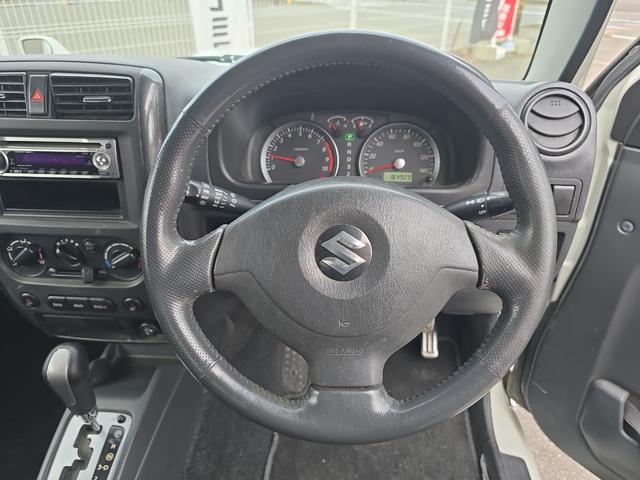 ジムニー ワイルドウインド 4WD キーレスエントリー 電動格納ミラー シートヒーター AT ABS CD ルーフレール アルミホイール 衝突安全ボディ エアコン パワーステアリング パワーウィンドウ 運転席エアバッグ(3枚目)