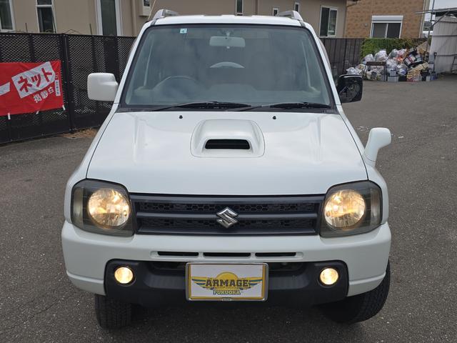 ジムニー ワイルドウインド 4WD キーレスエントリー 電動格納ミラー シートヒーター AT ABS CD ルーフレール アルミホイール 衝突安全ボディ エアコン パワーステアリング パワーウィンドウ 運転席エアバッグ(12枚目)