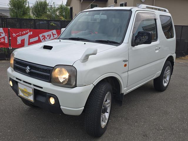 ジムニー ワイルドウインド 4WD キーレスエントリー 電動格納ミラー シートヒーター AT ABS CD ルーフレール アルミホイール 衝突安全ボディ エアコン パワーステアリング パワーウィンドウ 運転席エアバッグ(13枚目)