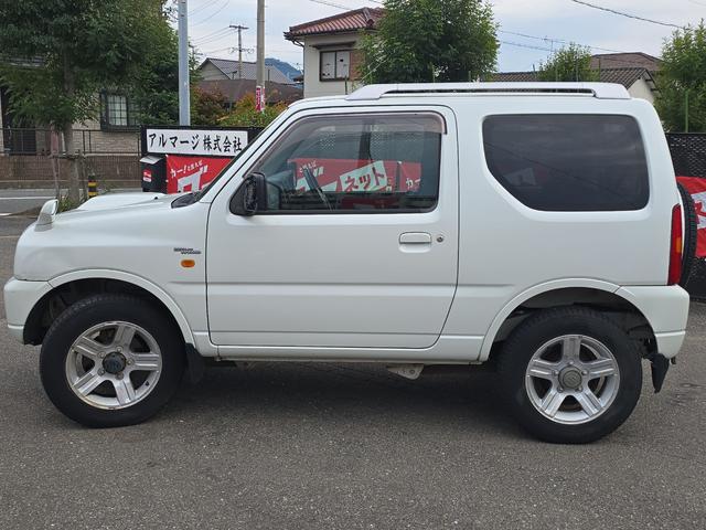 ジムニー ワイルドウインド 4WD キーレスエントリー 電動格納ミラー シートヒーター AT ABS CD ルーフレール アルミホイール 衝突安全ボディ エアコン パワーステアリング パワーウィンドウ 運転席エアバッグ(15枚目)