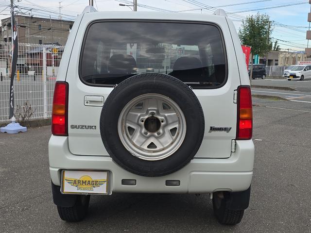 ジムニー ワイルドウインド 4WD キーレスエントリー 電動格納ミラー シートヒーター AT ABS CD ルーフレール アルミホイール 衝突安全ボディ エアコン パワーステアリング パワーウィンドウ 運転席エアバッグ(17枚目)