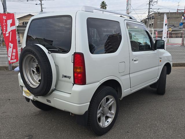 ジムニー ワイルドウインド 4WD キーレスエントリー 電動格納ミラー シートヒーター AT ABS CD ルーフレール アルミホイール 衝突安全ボディ エアコン パワーステアリング パワーウィンドウ 運転席エアバッグ(18枚目)
