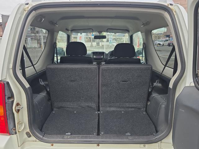 ジムニー ワイルドウインド 4WD キーレスエントリー 電動格納ミラー シートヒーター AT ABS CD ルーフレール アルミホイール 衝突安全ボディ エアコン パワーステアリング パワーウィンドウ 運転席エアバッグ(19枚目)