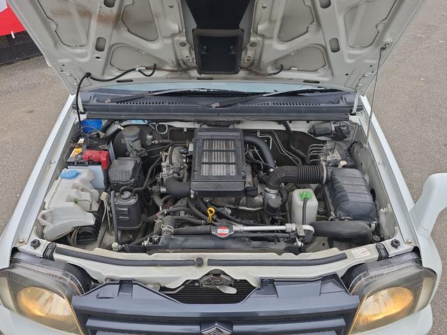 ジムニー ワイルドウインド 4WD キーレスエントリー 電動格納ミラー シートヒーター AT ABS CD ルーフレール アルミホイール 衝突安全ボディ エアコン パワーステアリング パワーウィンドウ 運転席エアバッグ(21枚目)