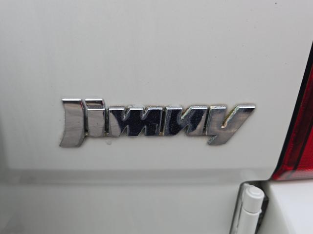 ジムニー ワイルドウインド 4WD キーレスエントリー 電動格納ミラー シートヒーター AT ABS CD ルーフレール アルミホイール 衝突安全ボディ エアコン パワーステアリング パワーウィンドウ 運転席エアバッグ(25枚目)