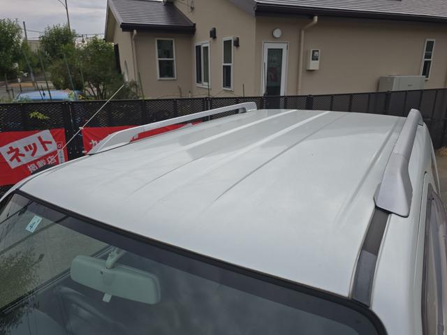 ジムニー ワイルドウインド 4WD キーレスエントリー 電動格納ミラー シートヒーター AT ABS CD ルーフレール アルミホイール 衝突安全ボディ エアコン パワーステアリング パワーウィンドウ 運転席エアバッグ(26枚目)