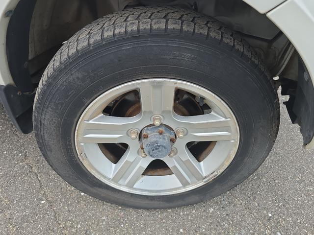 ジムニー ワイルドウインド 4WD キーレスエントリー 電動格納ミラー シートヒーター AT ABS CD ルーフレール アルミホイール 衝突安全ボディ エアコン パワーステアリング パワーウィンドウ 運転席エアバッグ(30枚目)