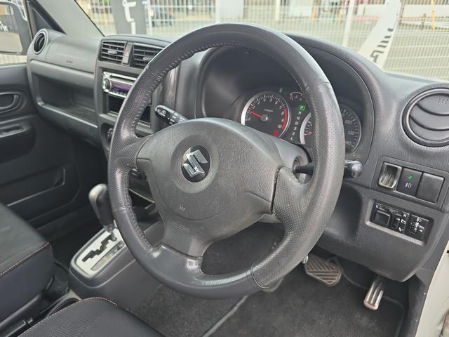 ジムニー ワイルドウインド 4WD キーレスエントリー 電動格納ミラー シートヒーター AT ABS CD ルーフレール アルミホイール 衝突安全ボディ エアコン パワーステアリング パワーウィンドウ 運転席エアバッグ(34枚目)