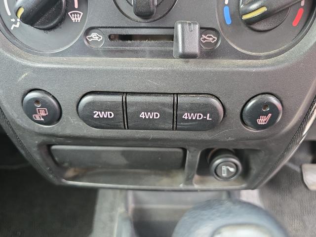 ジムニー ワイルドウインド 4WD キーレスエントリー 電動格納ミラー シートヒーター AT ABS CD ルーフレール アルミホイール 衝突安全ボディ エアコン パワーステアリング パワーウィンドウ 運転席エアバッグ(39枚目)