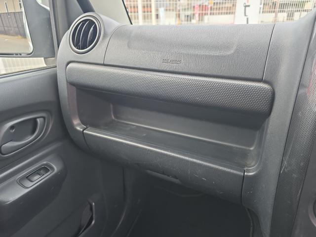 ジムニー ワイルドウインド 4WD キーレスエントリー 電動格納ミラー シートヒーター AT ABS CD ルーフレール アルミホイール 衝突安全ボディ エアコン パワーステアリング パワーウィンドウ 運転席エアバッグ(51枚目)