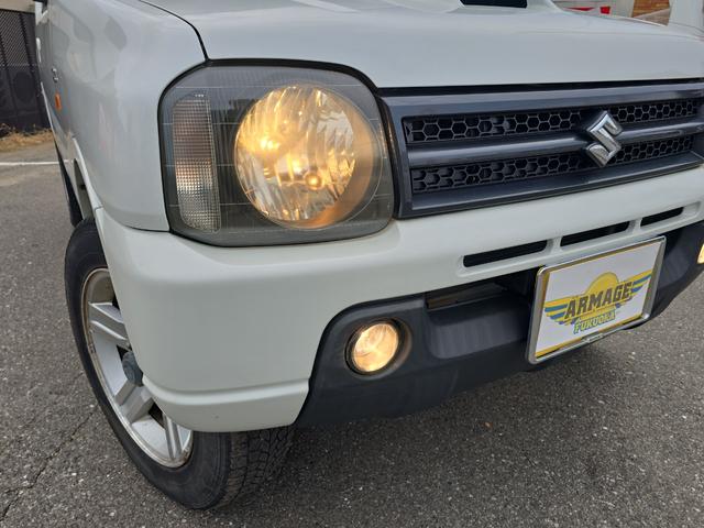 ジムニー ワイルドウインド 4WD キーレスエントリー 電動格納ミラー シートヒーター AT ABS CD ルーフレール アルミホイール 衝突安全ボディ エアコン パワーステアリング パワーウィンドウ 運転席エアバッグ(53枚目)