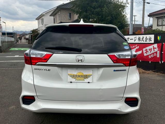 シャトル ハイブリッド　アルミホイール　スマートキー　ＡＴ　盗難防止システム　衝突安全ボディ　ＡＢＳ　ＥＳＣ　ＣＤ　ミュージックプレイヤー接続可　エアコン　パワーステアリング　パワーウィンドウ（16枚目）