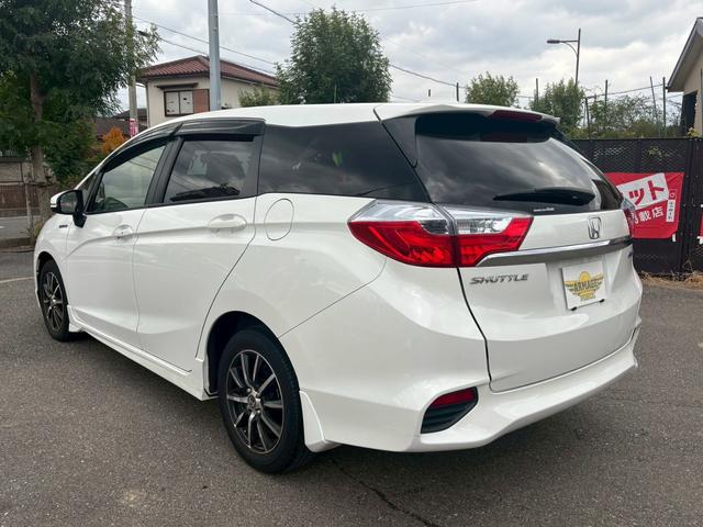 シャトル ハイブリッド　アルミホイール　スマートキー　ＡＴ　盗難防止システム　衝突安全ボディ　ＡＢＳ　ＥＳＣ　ＣＤ　ミュージックプレイヤー接続可　エアコン　パワーステアリング　パワーウィンドウ（17枚目）