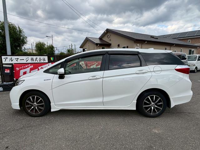 シャトル ハイブリッド　アルミホイール　スマートキー　ＡＴ　盗難防止システム　衝突安全ボディ　ＡＢＳ　ＥＳＣ　ＣＤ　ミュージックプレイヤー接続可　エアコン　パワーステアリング　パワーウィンドウ（18枚目）