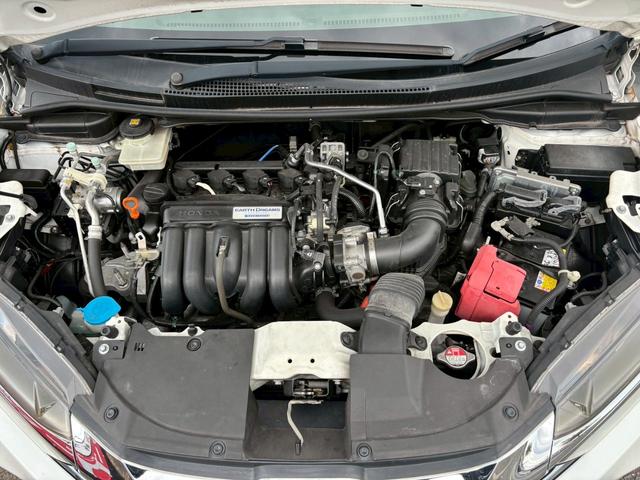 シャトル ハイブリッド　アルミホイール　スマートキー　ＡＴ　盗難防止システム　衝突安全ボディ　ＡＢＳ　ＥＳＣ　ＣＤ　ミュージックプレイヤー接続可　エアコン　パワーステアリング　パワーウィンドウ（22枚目）