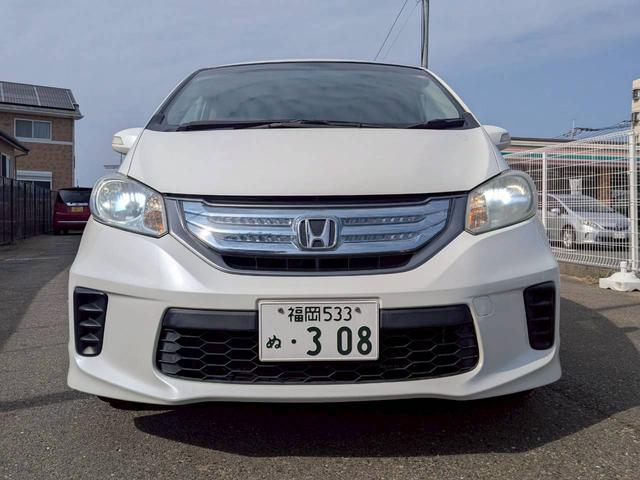 フリードハイブリッド ジャストセレクション＋　ＥＴＣ　バックカメラ　ナビ　ＴＶ　オートクルーズコントロール　両側電動スライドドア　オートライト　ＨＩＤ　スマートキー　電動格納ミラー　３列シート　ウォークスルー　ＣＶＴ　ＣＤ　ＤＶＤ再生　ＵＳＢ（12枚目）