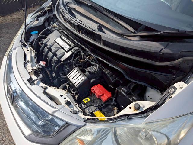 フリードハイブリッド ジャストセレクション＋　ＥＴＣ　バックカメラ　ナビ　ＴＶ　オートクルーズコントロール　両側電動スライドドア　オートライト　ＨＩＤ　スマートキー　電動格納ミラー　３列シート　ウォークスルー　ＣＶＴ　ＣＤ　ＤＶＤ再生　ＵＳＢ（22枚目）