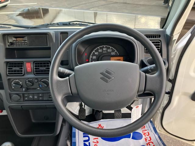 キャリイトラック ＫＣエアコン・パワステ農繁　７型　５ＭＴ　パートタイム４ＷＤ　オートライト　衝突被害軽減システム　アイドリングストップ　横滑り防止機能　衝突安全ボディ　５ＭＴ　パートタイム４ＷＤ　キーレスエントリー　パワーウインドウ　リアゲートチェーン　デフロック（22枚目）