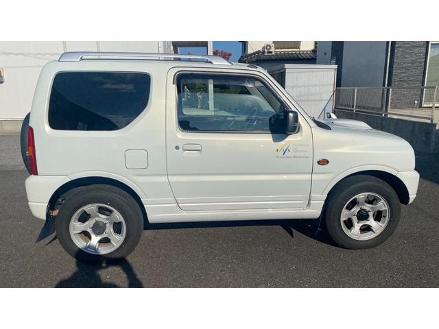 ジムニー ＦＩＳフリースタイルワールドカップリミテッド　Ｂｌｕｅｔｏｏｔｈオーディオ・パートタイム４ＷＤ高低２段切り替え式（後輪駆動ベース）・ＤＯＨＣインタークーラーターボ・フロア４ＡＴ（11枚目）