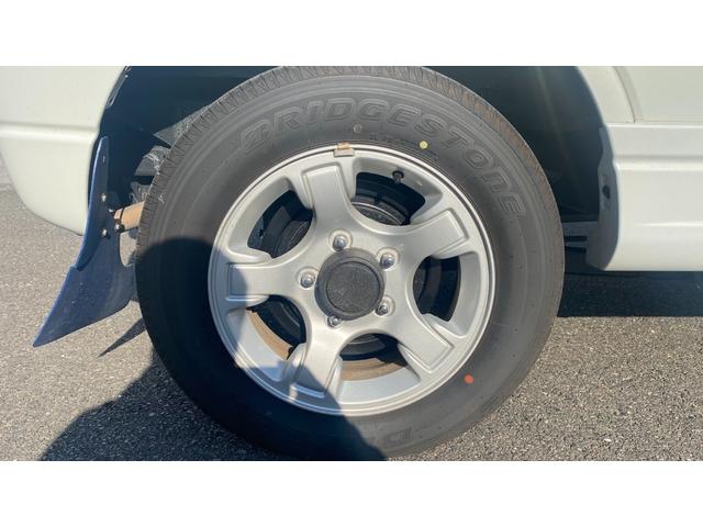 ジムニー ＦＩＳフリースタイルワールドカップリミテッド　Ｂｌｕｅｔｏｏｔｈオーディオ・パートタイム４ＷＤ高低２段切り替え式（後輪駆動ベース）・ＤＯＨＣインタークーラーターボ・フロア４ＡＴ（15枚目）