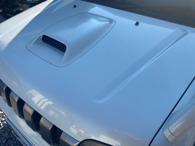 ジムニー ＦＩＳフリースタイルワールドカップリミテッド　Ｂｌｕｅｔｏｏｔｈオーディオ・パートタイム４ＷＤ高低２段切り替え式（後輪駆動ベース）・ＤＯＨＣインタークーラーターボ・フロア４ＡＴ（21枚目）