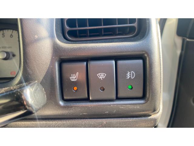 ジムニー ＦＩＳフリースタイルワールドカップリミテッド　Ｂｌｕｅｔｏｏｔｈオーディオ・パートタイム４ＷＤ高低２段切り替え式（後輪駆動ベース）・ＤＯＨＣインタークーラーターボ・フロア４ＡＴ（34枚目）