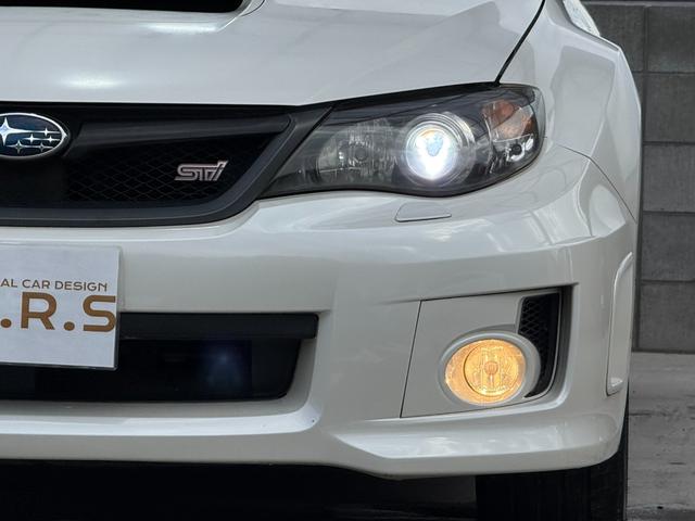 インプレッサ ＷＲＸ　ＳＴｉ　６速マニュアル　４ＷＤ　Ｂｌｕｅｔｏｏｔｈ接続　フルセグ　社外ナビ　ＳＴＩハーフレザーパワーシート　デフイブースト計　純正エアロ　スマートキー２個　ＥＴＣ　リアスポイラー　ＳＴＩ純正アルミホイール（64枚目）