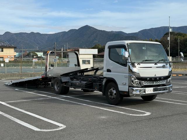 キャンター 積載車　セキサイシャ　キャリアカー　車輌運搬車　キャンターカスタム　ユニックネオ５　ＵＣ－３５（２０２１年式）　ラジコン　Ｂｌｕｅｔｏｏｔｈオーディオ　スマートキー　積載量３１５０キロ　荷台寸法　長さ５７０　幅２０７　メッキバンパー　左右開閉あおり（5枚目）