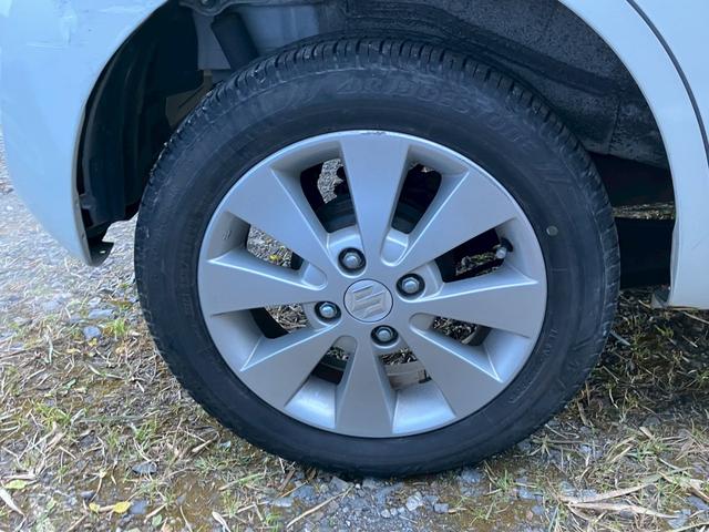 ワゴンＲ ＦＸ　キーレス　ＣＤ　純正アルミ　セキュリティアラーム　プライバシーガラス　オートＡＣ　アイドリングストップ　ヘッドライトレベライザー　電動格納ドアミラー（8枚目）