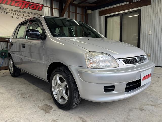 ロゴ Ｇ　５速マニュアル／（9枚目）