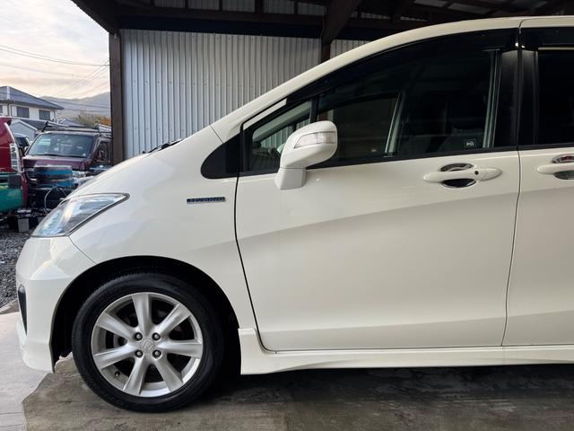 フリードハイブリッド ジャストセレクション　ＳＤナビ／ＴＶ／ＤＶＤ再生／Ｂｌｕｅｔｏｏｔｈオーディオ／バックカメラ／無限グリル／マット／スマートキー／（55枚目）