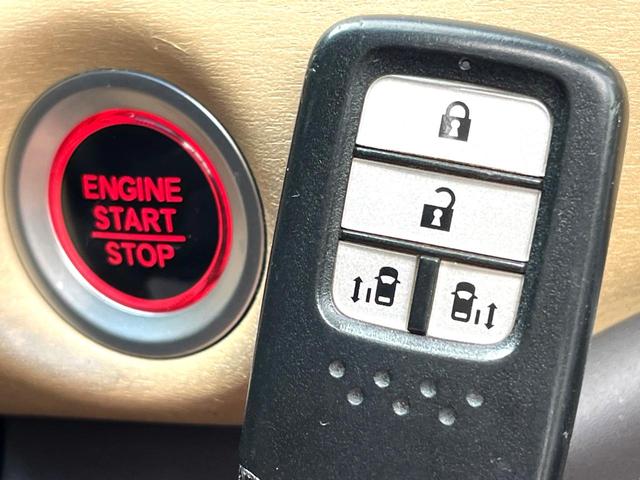 フリード G 両側電動ドア バックカメラ スマートキー ビルトインETC オートエアコン Bluetooth CD DVD再生 地デジ 横滑り防止装置 電動格納ミラー アイドリングストップ ドアバイザー(7枚目)