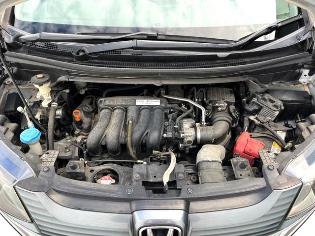 フリード G 両側電動ドア バックカメラ スマートキー ビルトインETC オートエアコン Bluetooth CD DVD再生 地デジ 横滑り防止装置 電動格納ミラー アイドリングストップ ドアバイザー(19枚目)