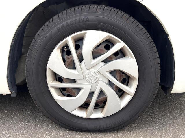 フリード G 両側電動ドア バックカメラ スマートキー ビルトインETC オートエアコン Bluetooth CD DVD再生 地デジ 横滑り防止装置 電動格納ミラー アイドリングストップ ドアバイザー(50枚目)