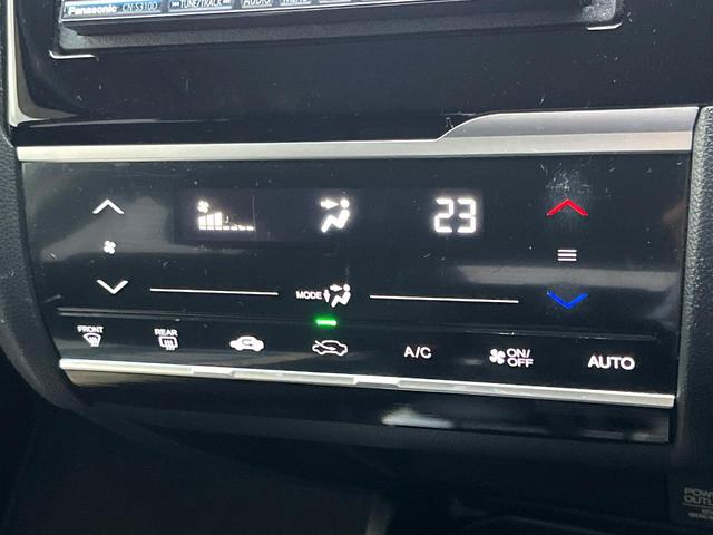フィット 13G・Lパッケージ 禁煙車 スマートキー ビルトインETC オートライト オートエアコン Bluetooth CD DVD再生 地デジ バックカメラ 横滑り防止装置 電動格納ミラー ドアバイザー パワーウインドウ(21枚目)